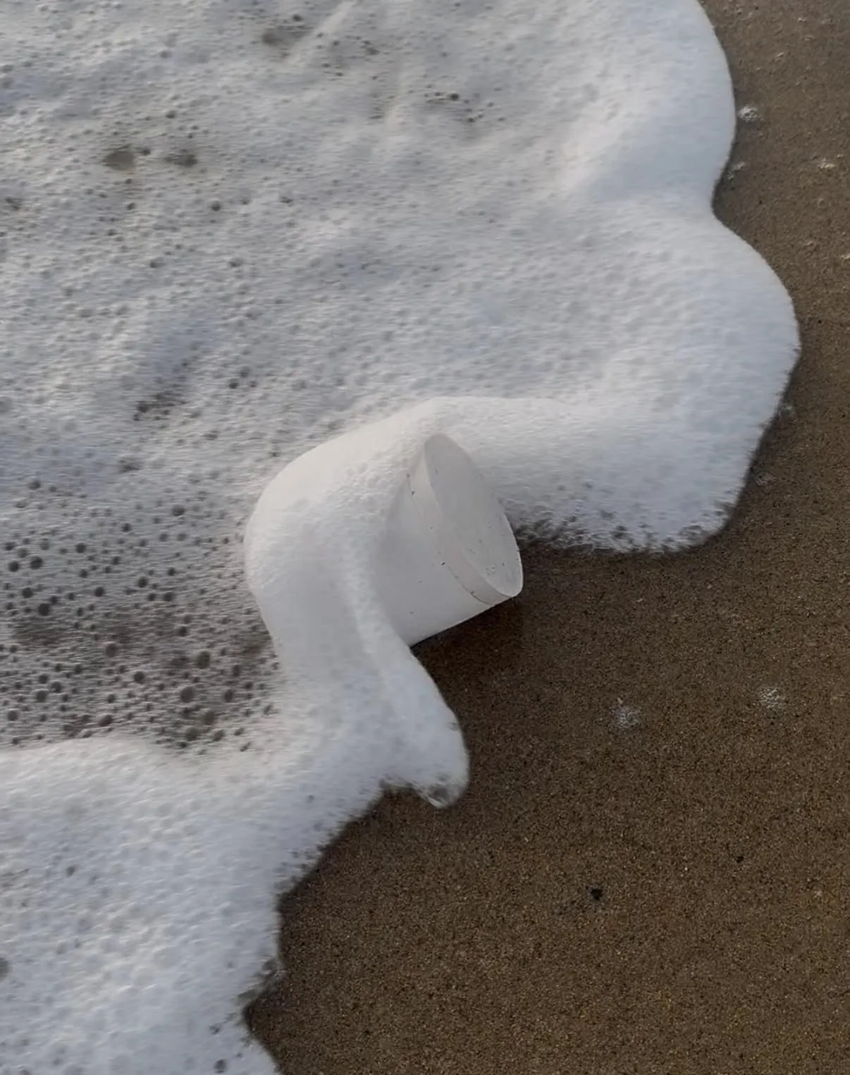 Sea foam on the Swedish coast — the landscape behind LUĒR hand-poured ritual candles